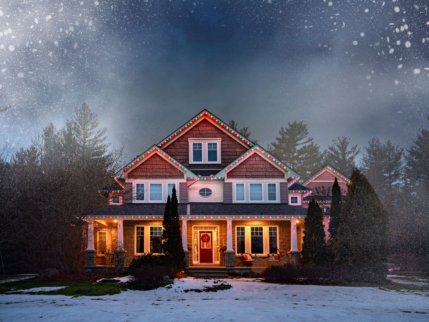 Home with Evercrest Exteriors permanent lighting in winter