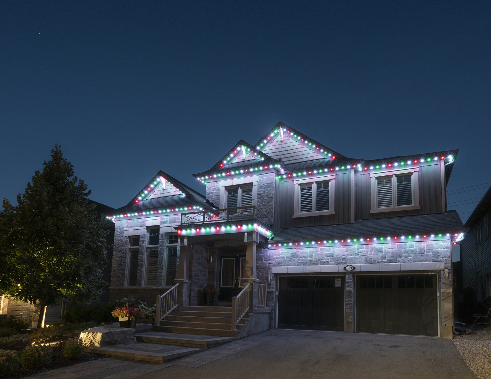 Home with Evercrest Exteriors multicolor Christmas lighting